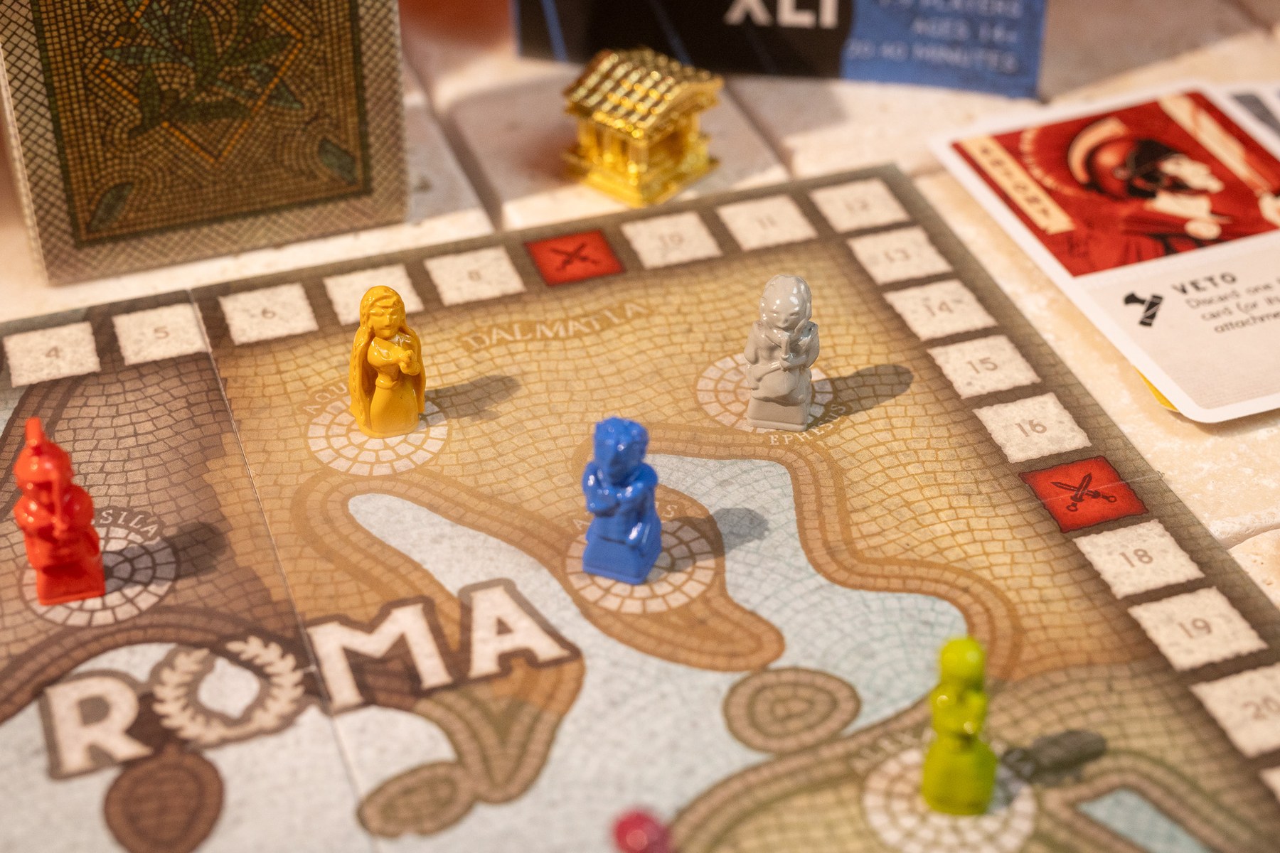 The Roma XLI mosaic board mid-game with player pawns